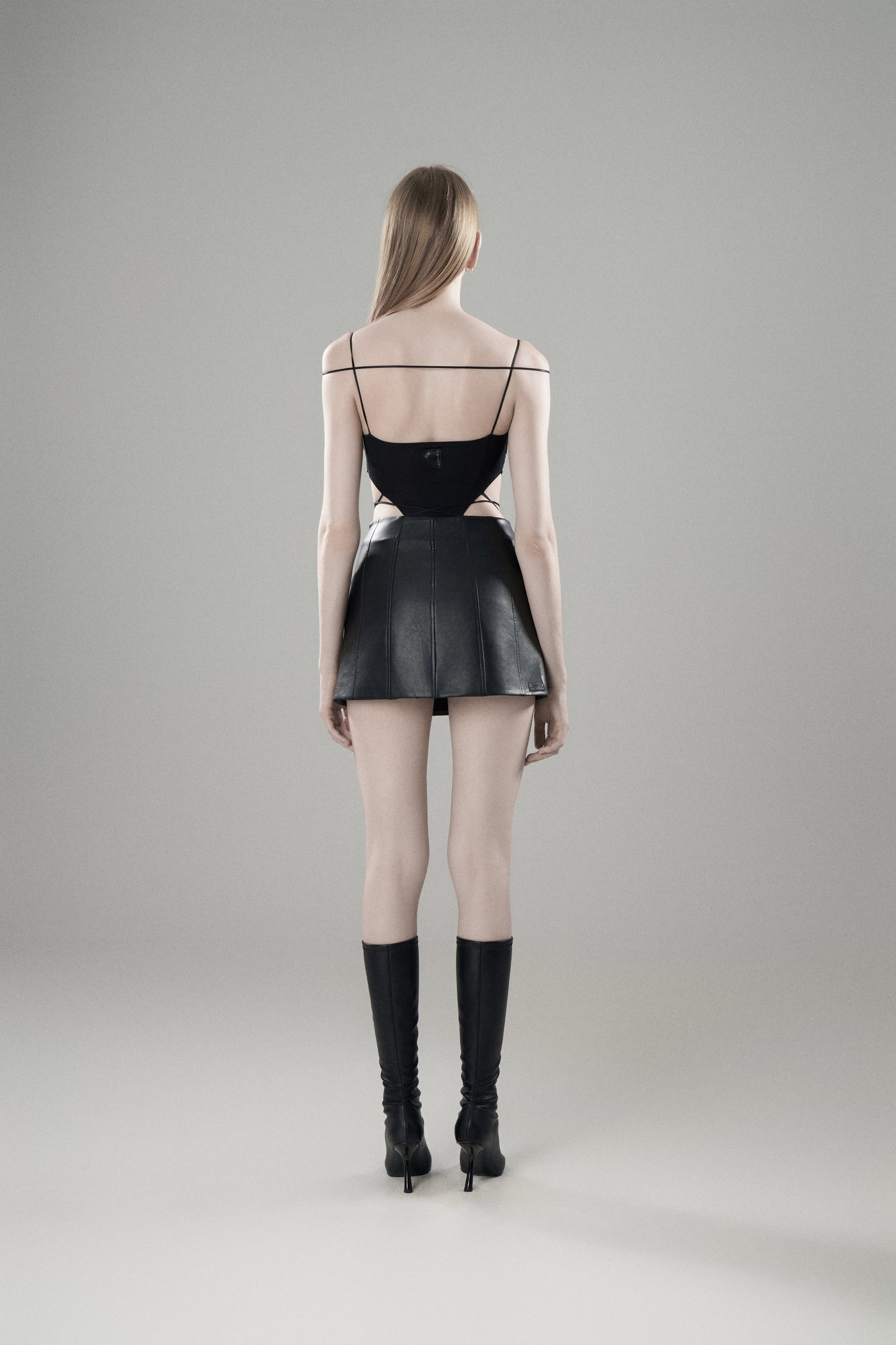 METAL BUCKLE EMBELLISHED LEATHER SKIRT