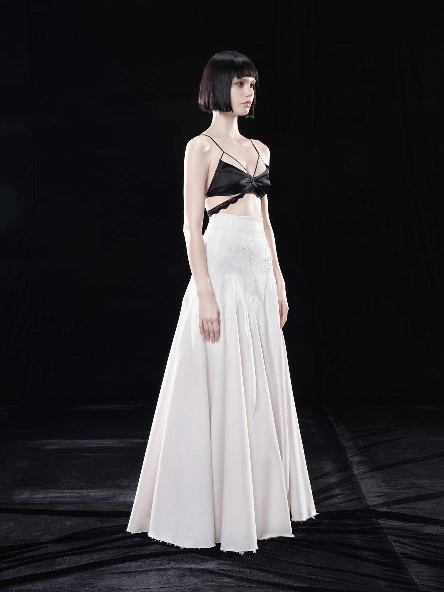 TEXTURED LONG VOLUMINOUS FLARED SKIRT WITH RAW EDGES