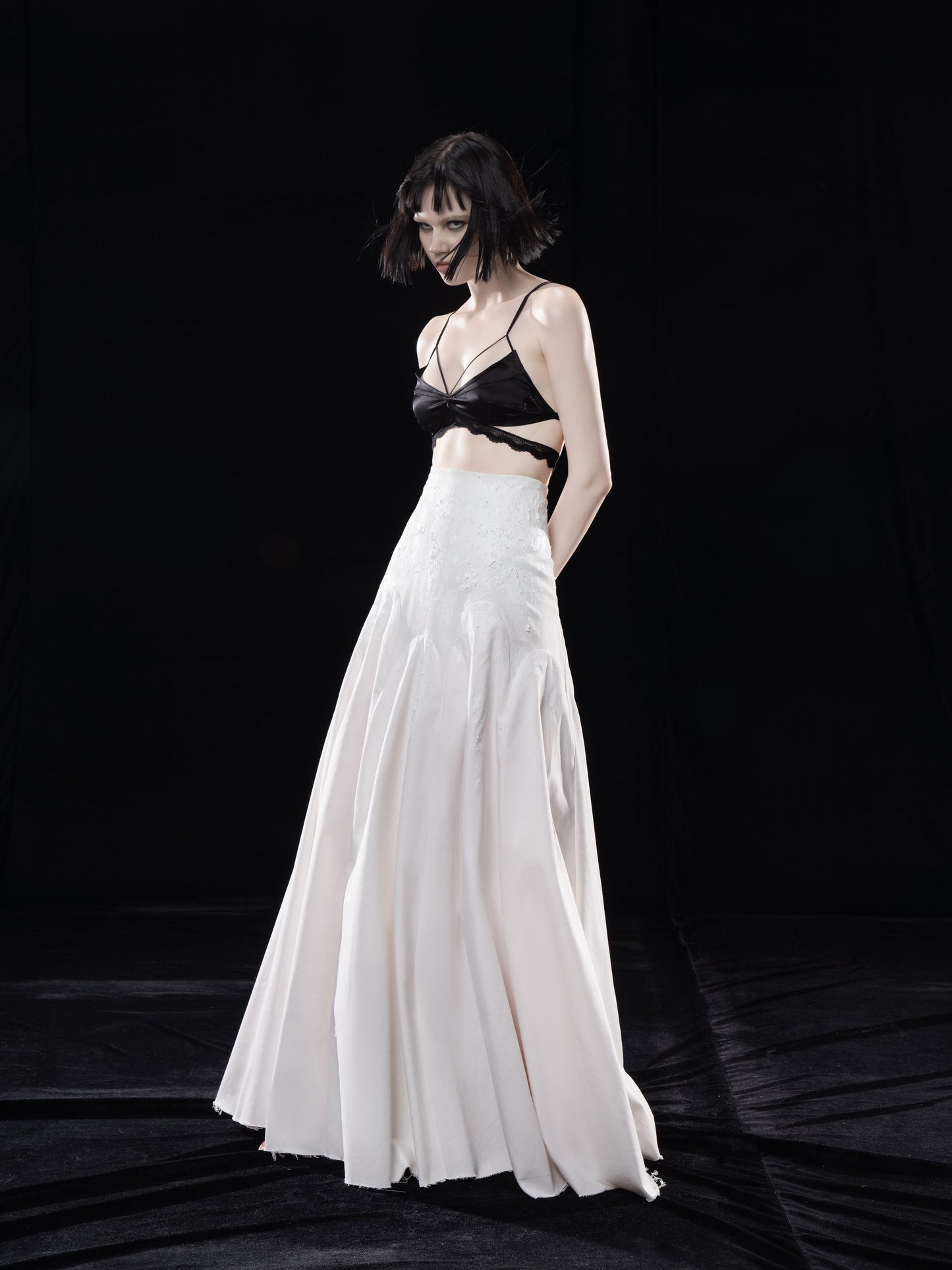 TEXTURED LONG VOLUMINOUS FLARED SKIRT WITH RAW EDGES