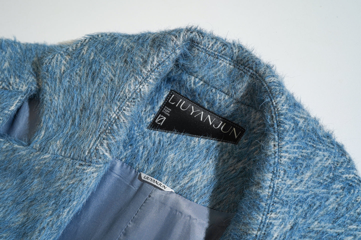 Deconstructed Multy-style Fishtail Coat