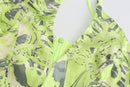 NEON GREEN PRINTED HALTERNECK DRAPED DRESS WITH CUT-OUTS