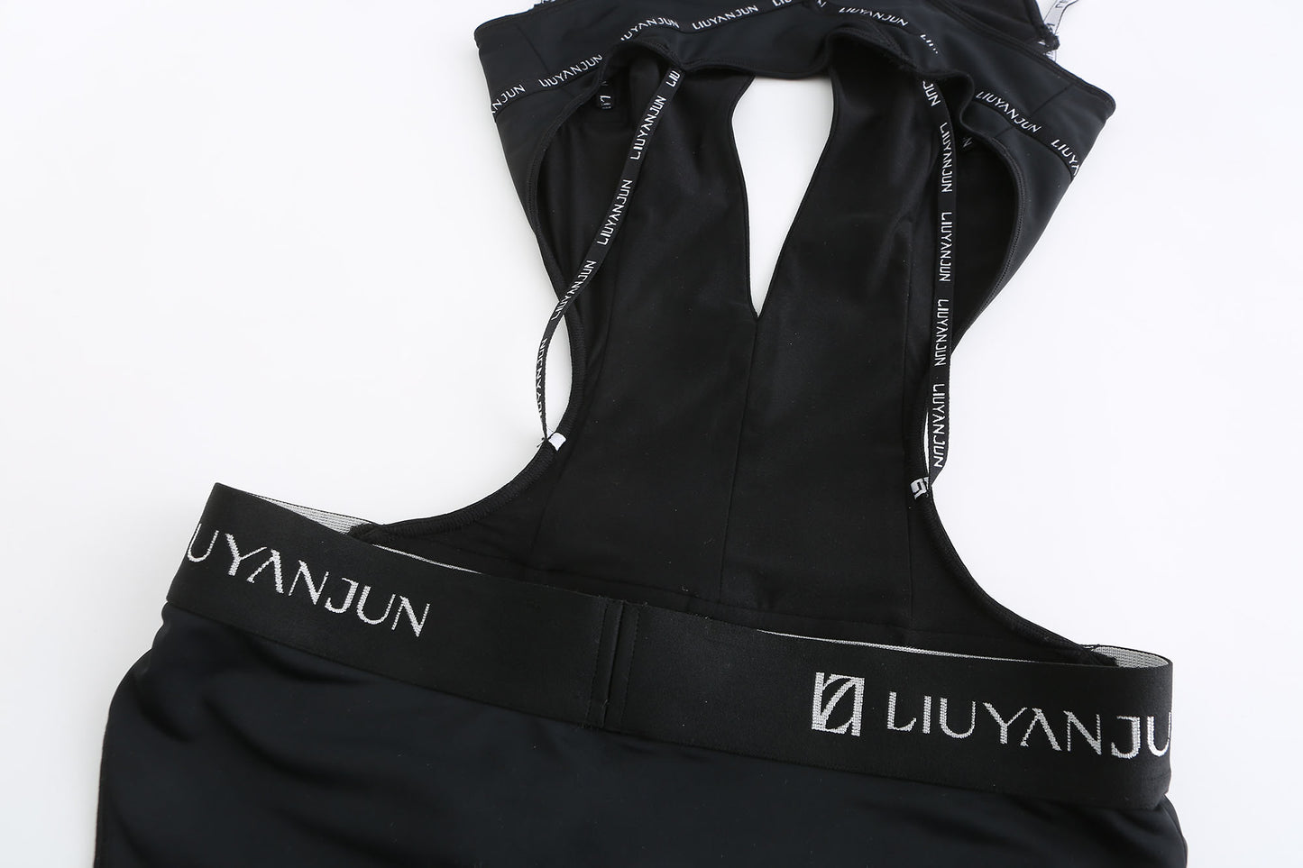 BLACK SWIMSUIT WITH STRAPS AND CUT-OUTS