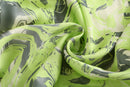 NEON GREEN PRINTED DRAPED DRESS WITH TIED. DETAIL