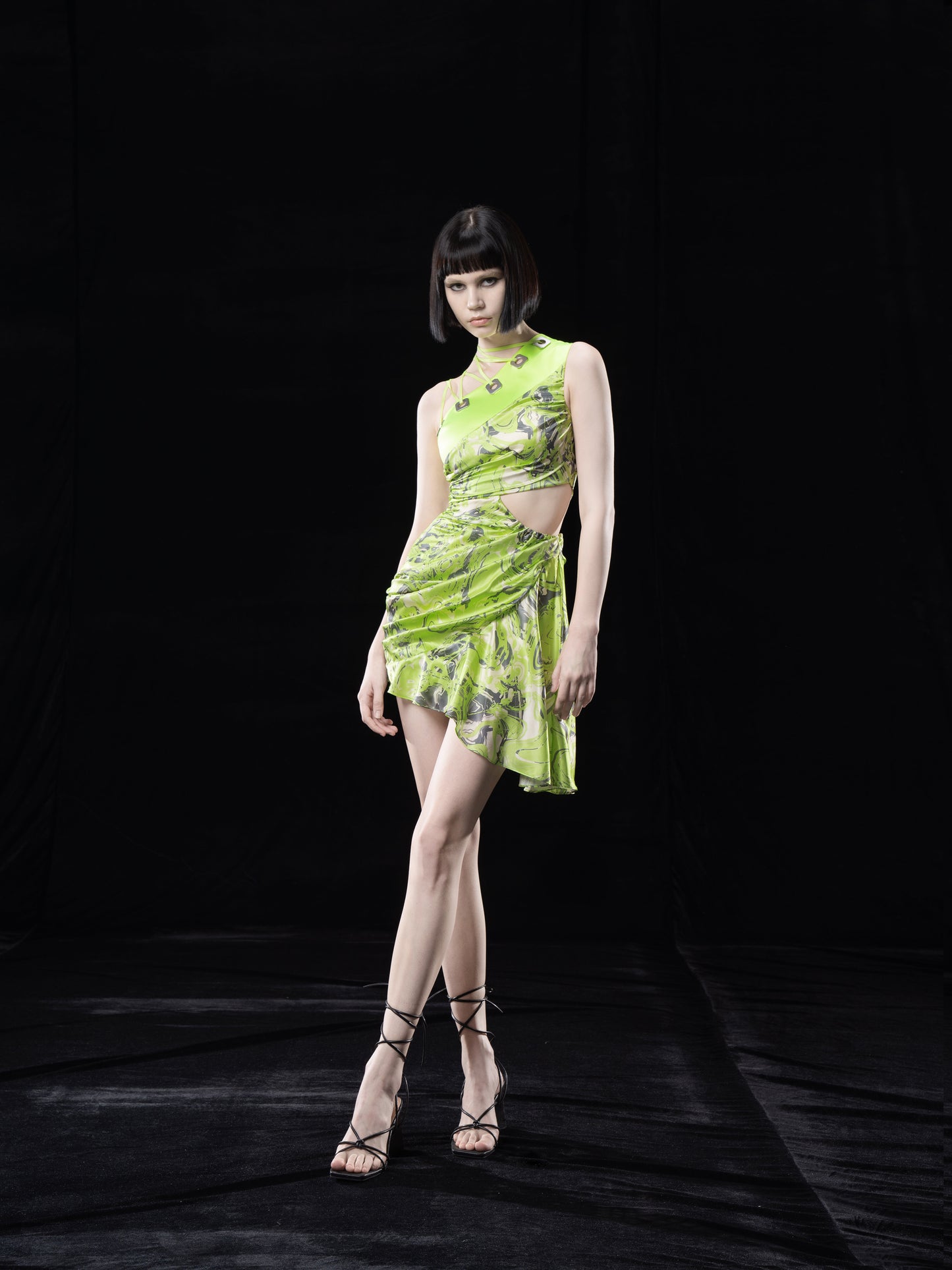 NEON GREEN PRINTED DRAPED DRESS WITH TIED. DETAIL